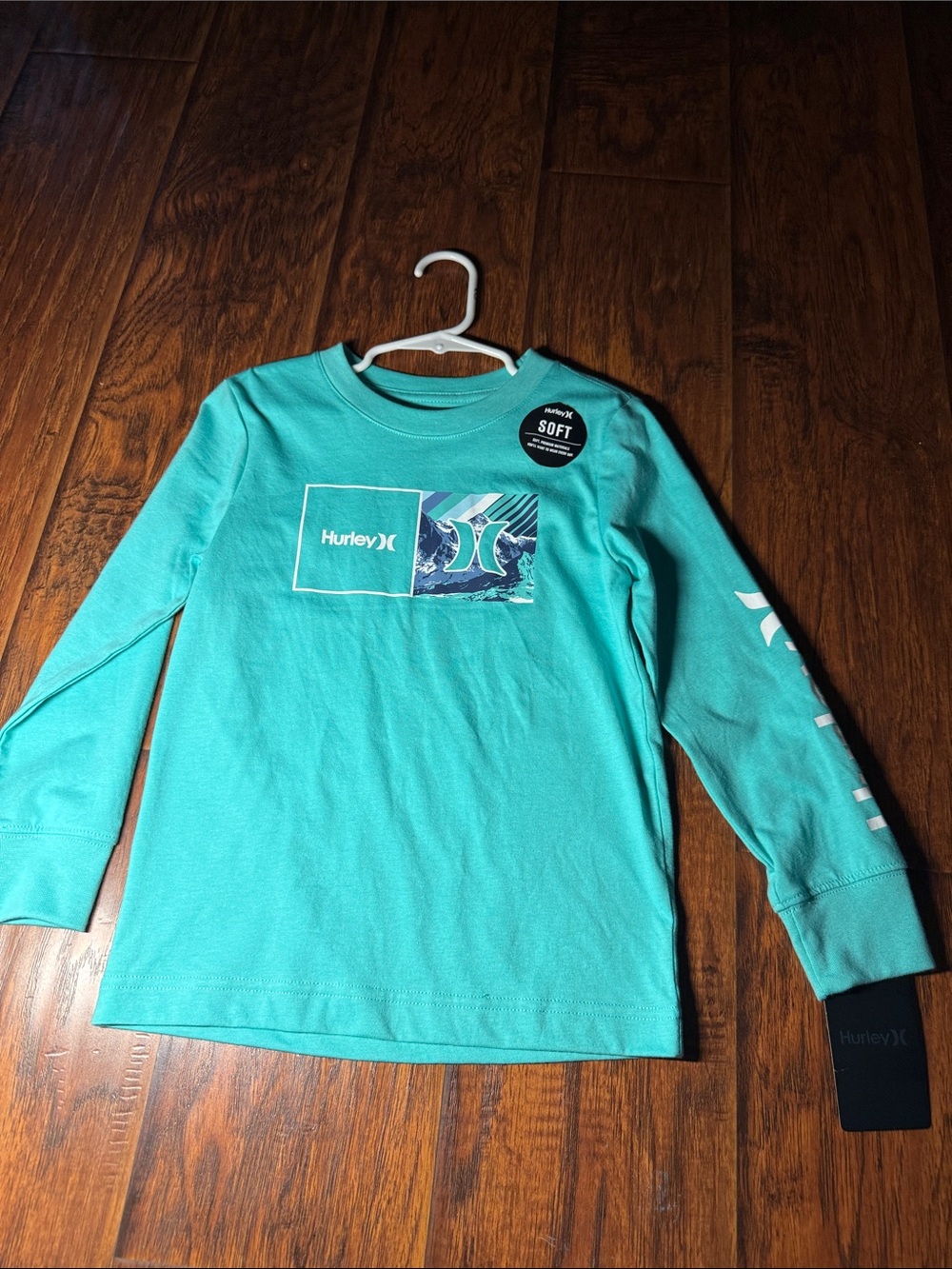 Hurley Boys Teal Long Sleeve Tee with White Logo. New w tag. Size 6